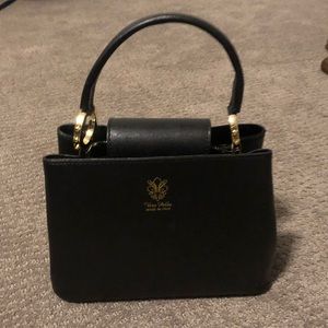 Never used black genuine leather purse